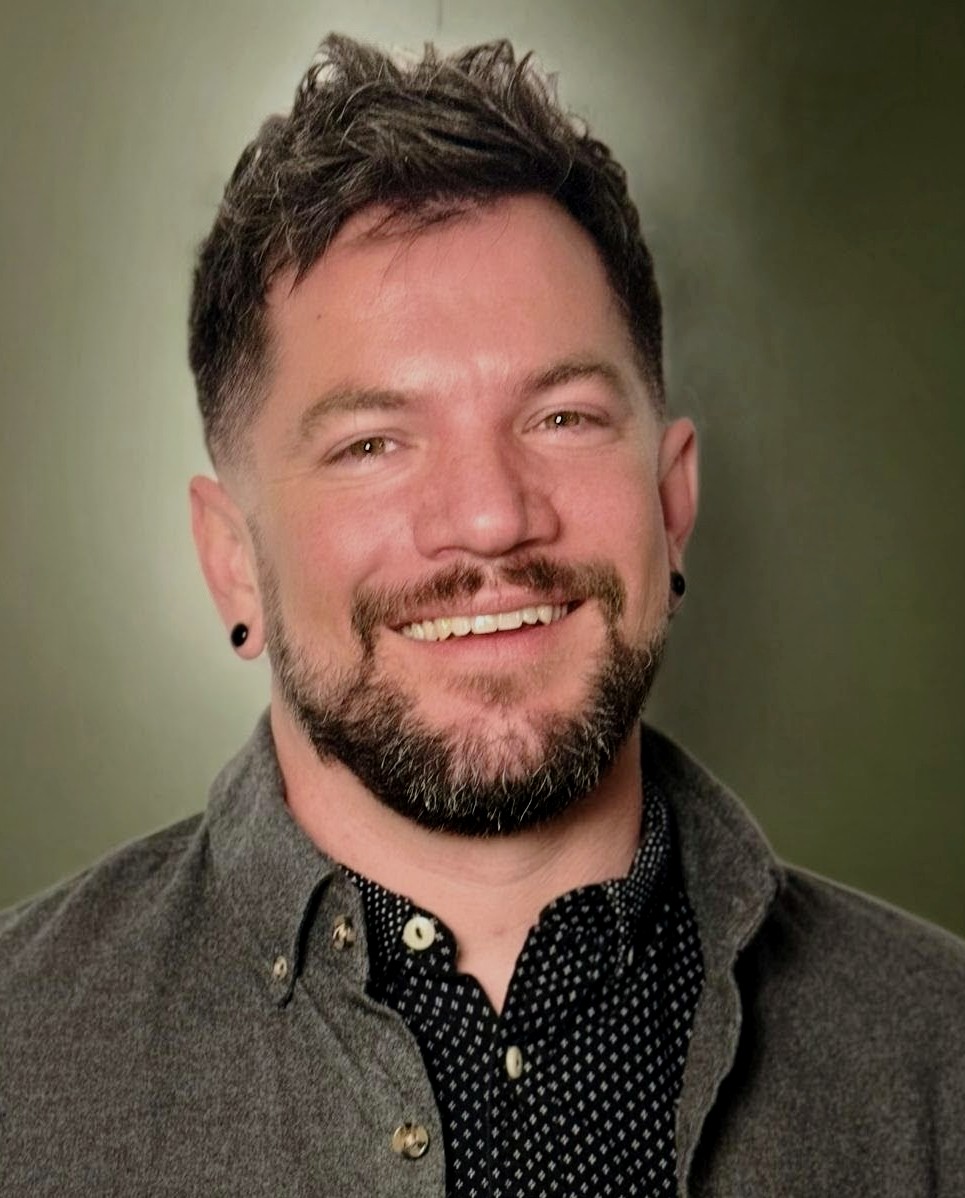 A headshot of Ryan Crumley.